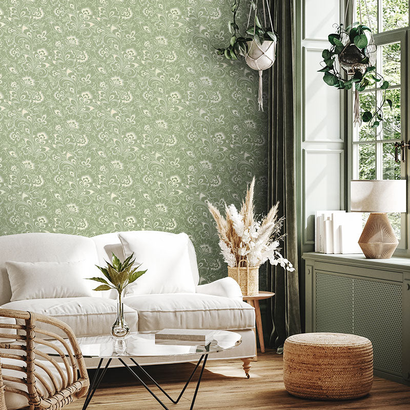 Soft green wallpaper on the wall in a living room.