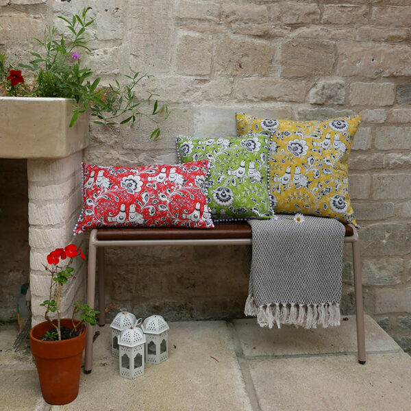Folk-inspired cushions made with red linen fabric